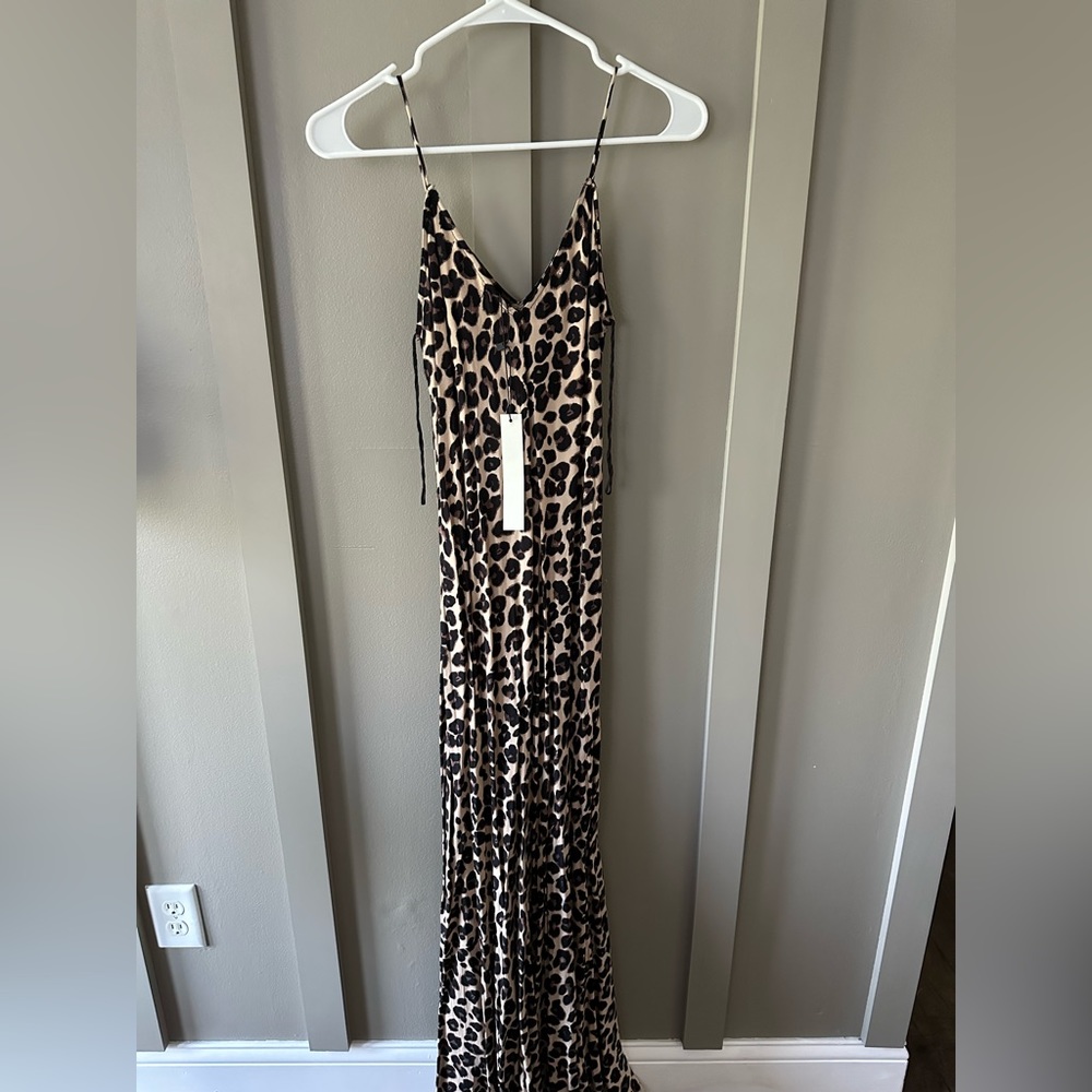 Mustard seed size small cheetah dress. Has slit on the side. Never worn